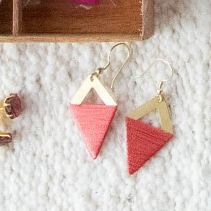 Diamond earrings with peach threadwork | TradeAid