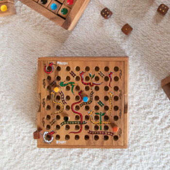 Wooden snakes and ladders game