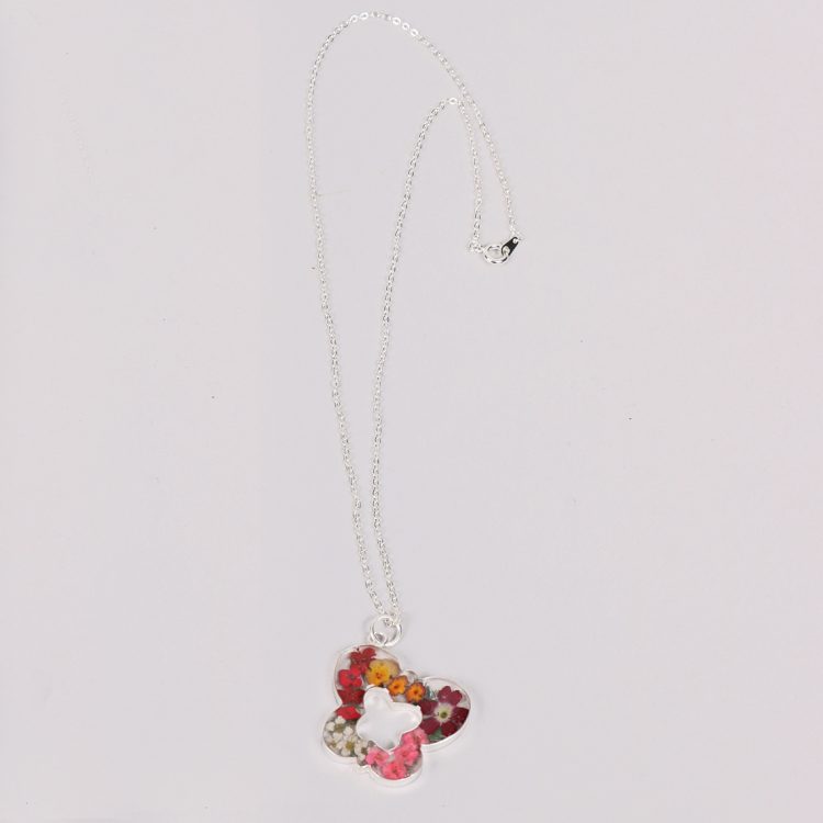 Floral resin pendant | TradeAid
