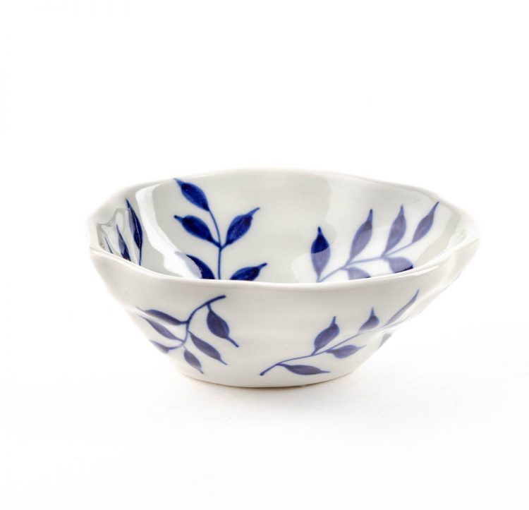 White bowl with blue leaves