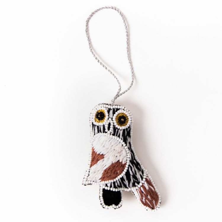 Wise owl hanging