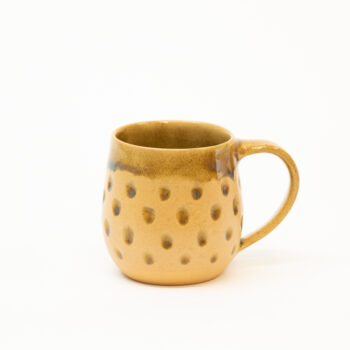 Spotty stoneware teacup