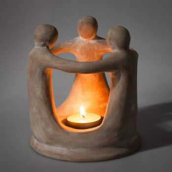 Three figures candle holder