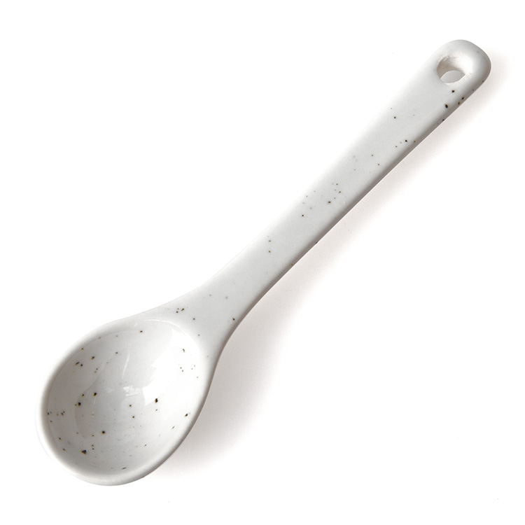 White speckled salt spoon